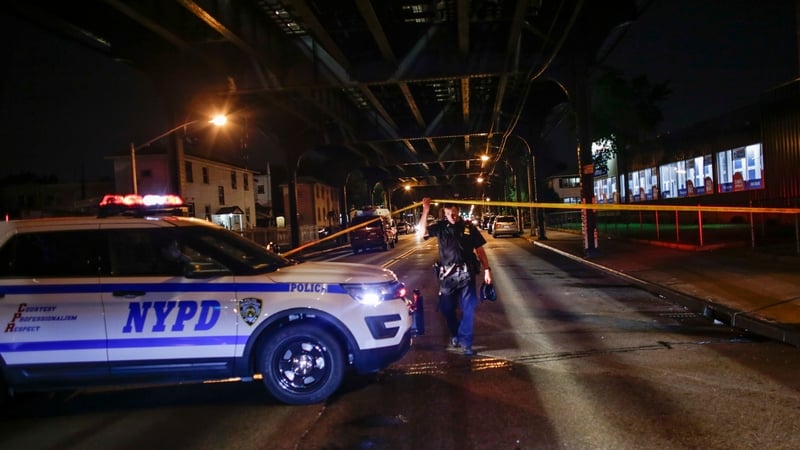 A NYPD officer at the scene of the shooting in Ozone Park, New York