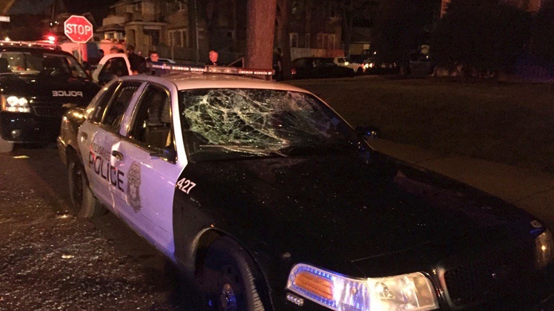 A damaged police car is pictured after the violence broke out in Milwaukee