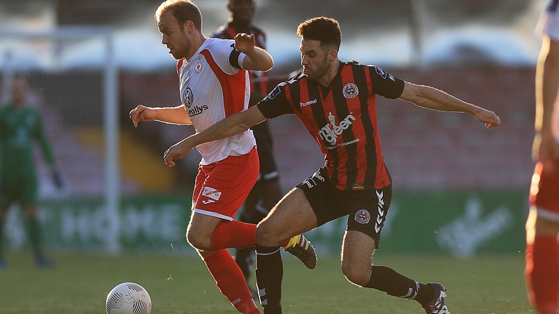 Craig Roddan with Roberto Lopes