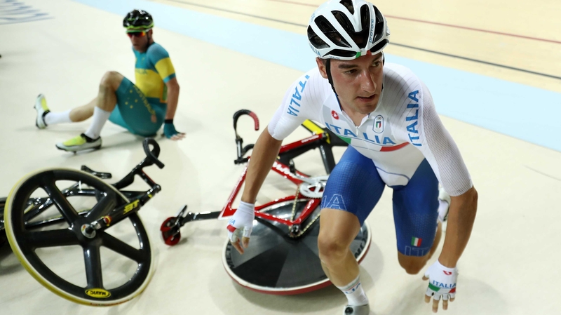 Elia Viviani of Italy (R) and Glenn O'Shea of Australia crash during the Men's Omnium