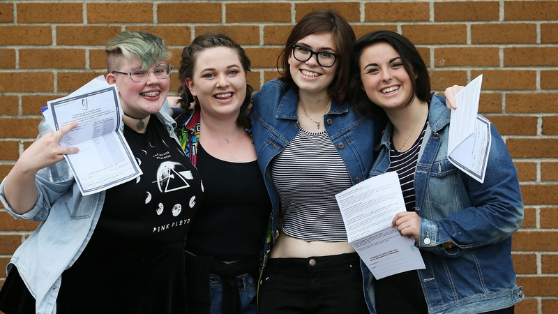 Megan Cassidy, Sibeal Ni Mhaoileoin, Phoebe Kelly McDonnell and Hazel O'Kelly, after collecting their Leaving Certificate exam results at Mount Temple School in Dublin