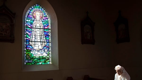A quiet prayer at Knock in Aoife Kelleher's illuminating film, Strange Occurences in a Small Irish Village