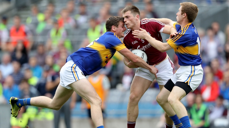 Conor Sweeney and Brian Fox keep tabs on Galway's Liam Silke during the All-Ireland quarter-final