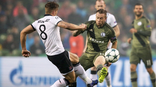 John Mountney tackles Thibault Moulin