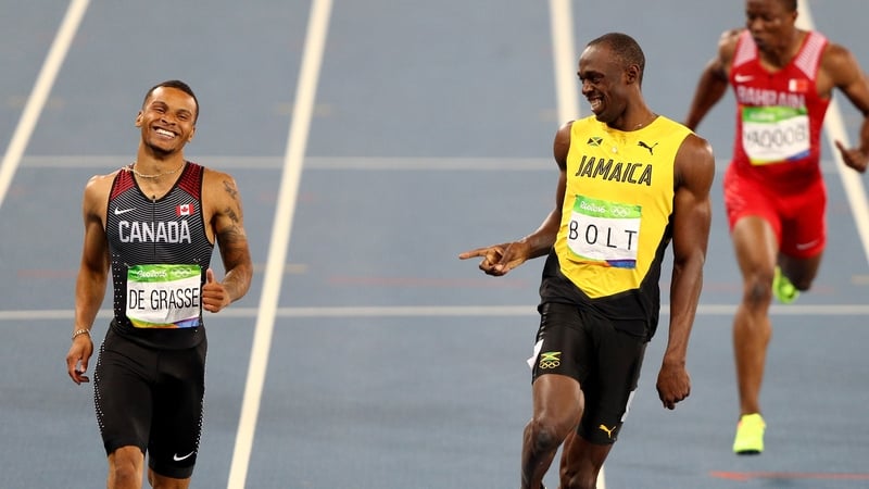 All smiles for Andre De Grasse and Usain Bolt