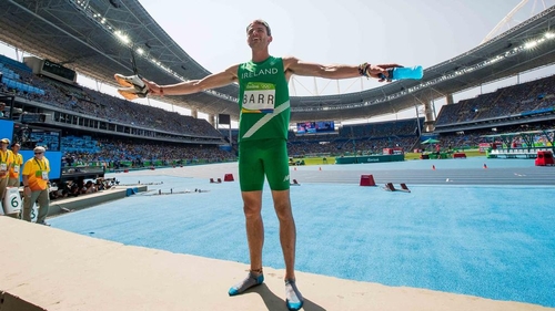 Thomas Barr thanking the Ireland fans in the stadium after his remarkable race