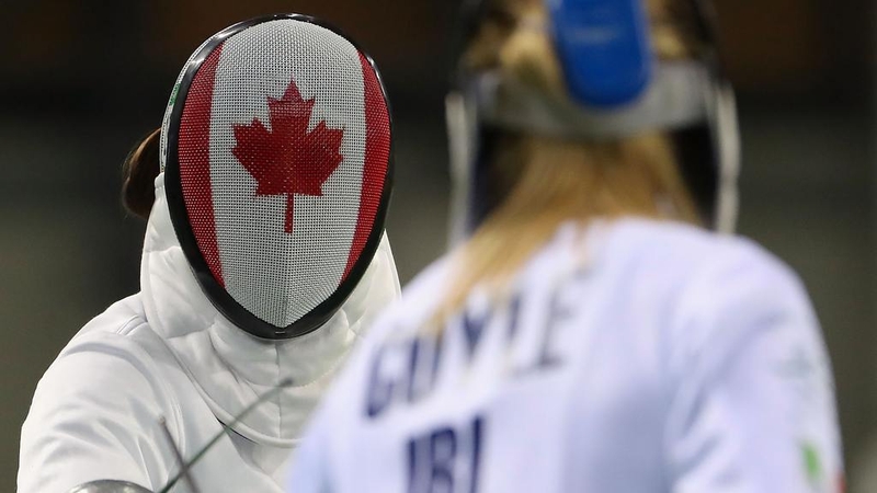 Modern pentathlon event includes fencing, swimming, showjumping, running and shooting