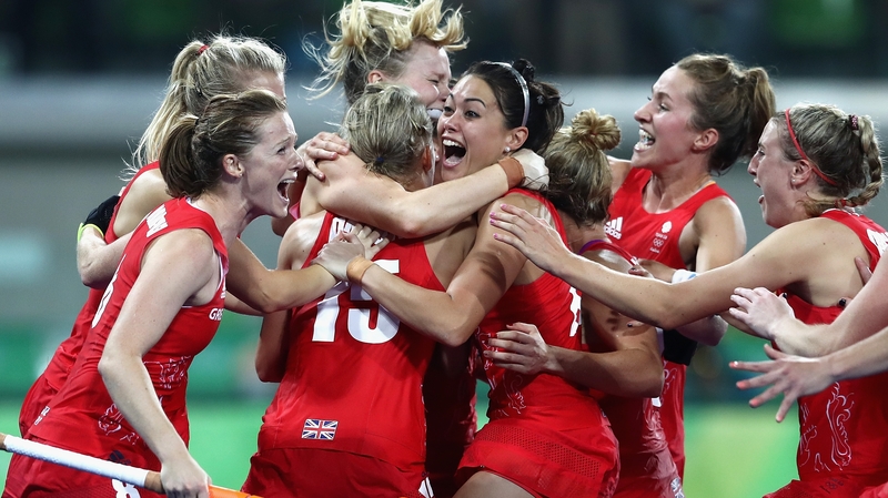 Great Britain players celebrating winning the shoot out against Netherlands to win the Women's Gold Meda
