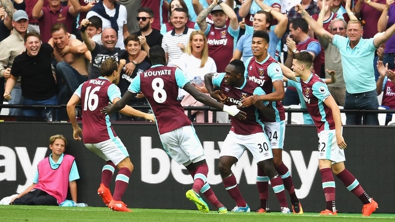 Michail Antonio celebrates scoring the winning goal with team-mates
