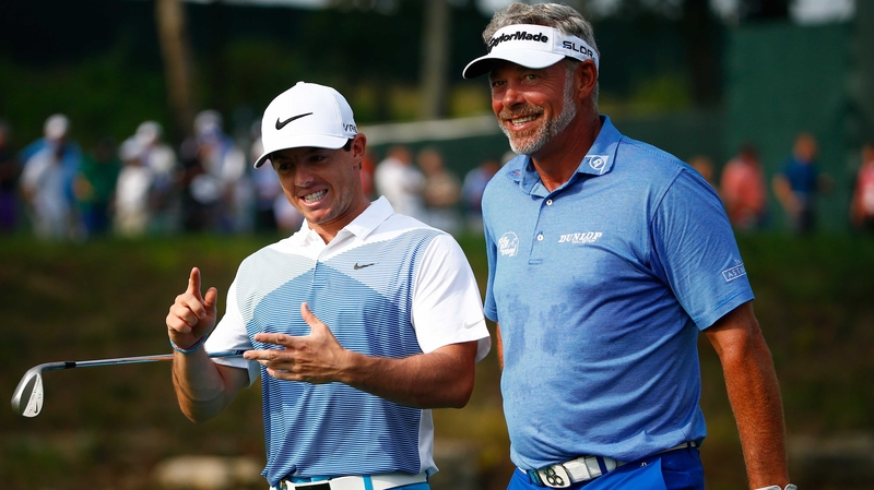Rory McIlroy (L) with Darren Clarke