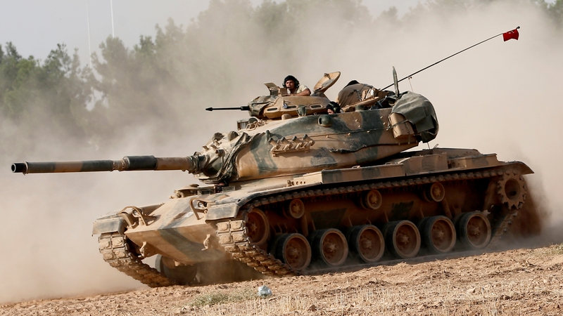 Turkish forces mounting an offensive into Syria