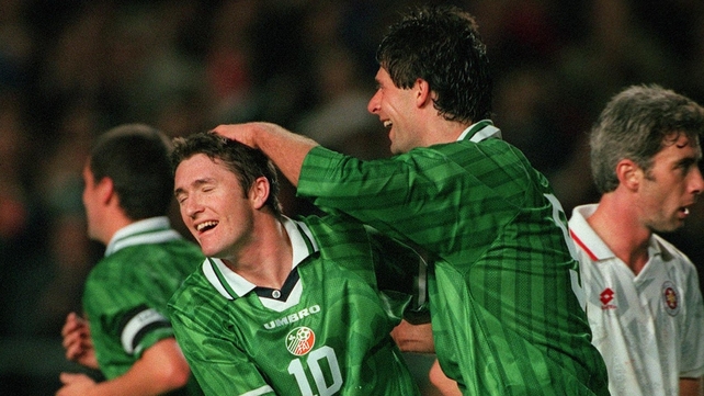Niall Quinn congratulates Keane following his first international goal against Malta in 1998