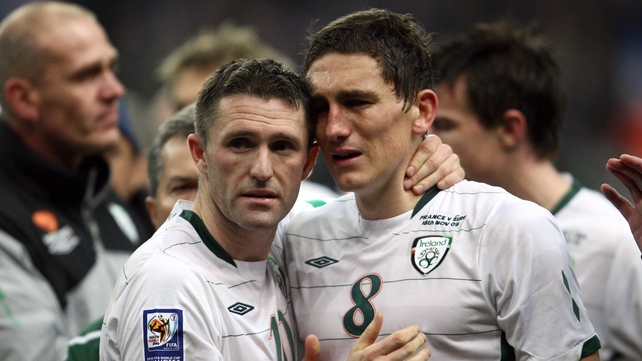 A dejected Keith Andrews and Keane following their controversial defeat in the 2010 World Cup play-off defeat to France
