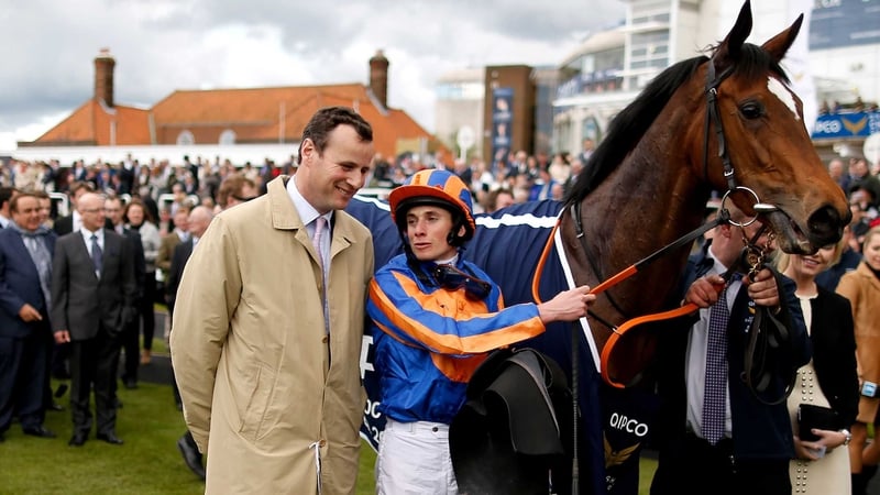 David Wachman (L) with Ryan Moore after he rode Legatissimo to win The Qipco 1000 Guineas Stakes at Newmarket last year