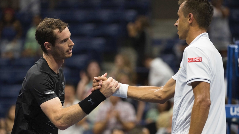 Andy Murray consoles Lukas Rosol at the end