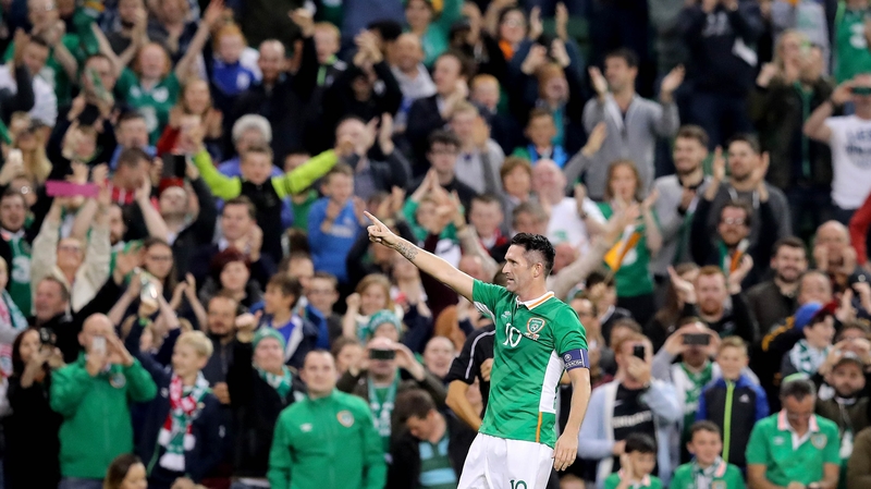 Robbie Keane takes the adulation from the fans after scoring his final international goal