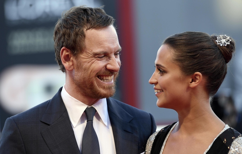 Michael Fassbener and Alicia Vikander on the red carpet in Venice
