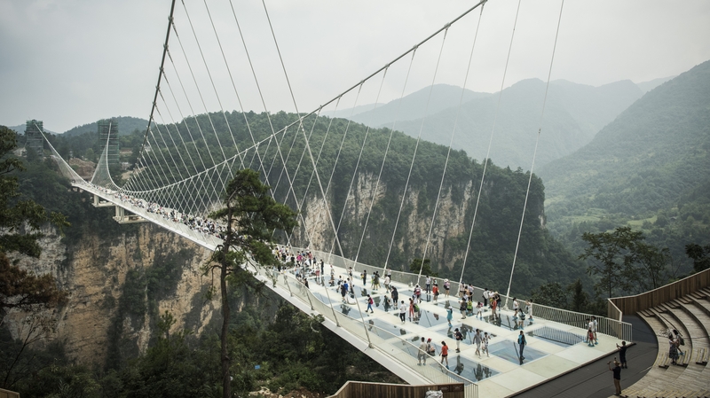 More than 10,000 visitors a day flooded over the glass walkway in Zhangjiajie