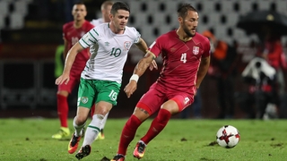 Republic of Ireland's Robbie Brady tackles Nemanja Gudelj of Serbia