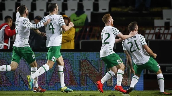 Ireland players mob Daryl Murphy