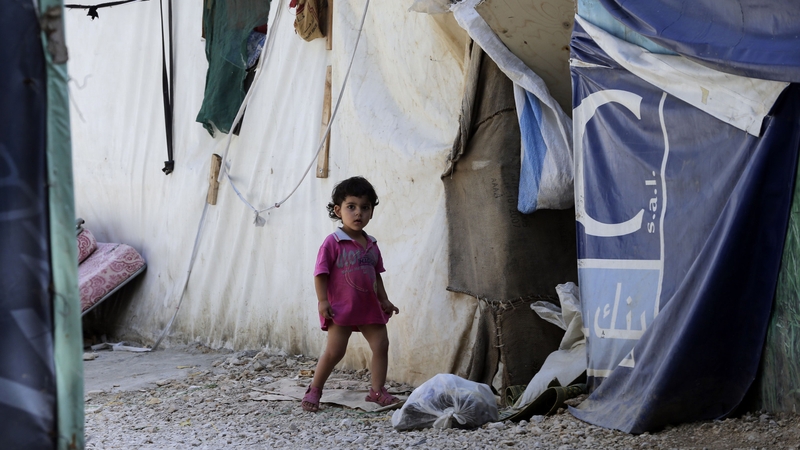 A Syrian child at an unofficial camp for refugees in the Bekaa Valley, central Lebanon