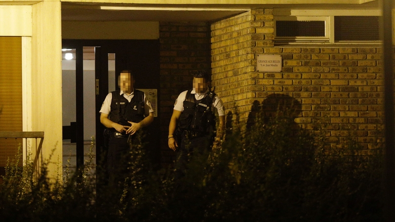 French police outside a building in Boussy-Saint-Antoine where the three women were arrested
