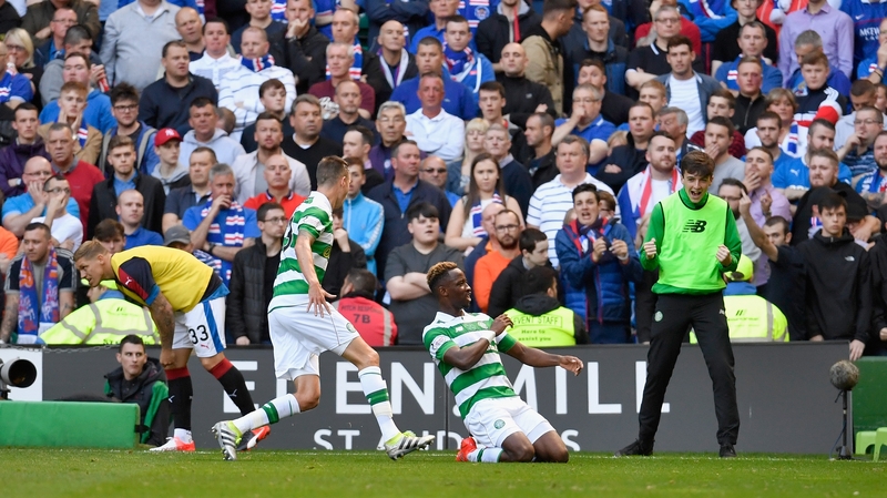 Moussa Dembelle celebrates his opening goal