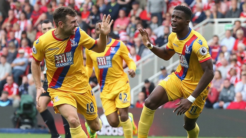 Wilfried Zaha (R) scored Palace's second goal