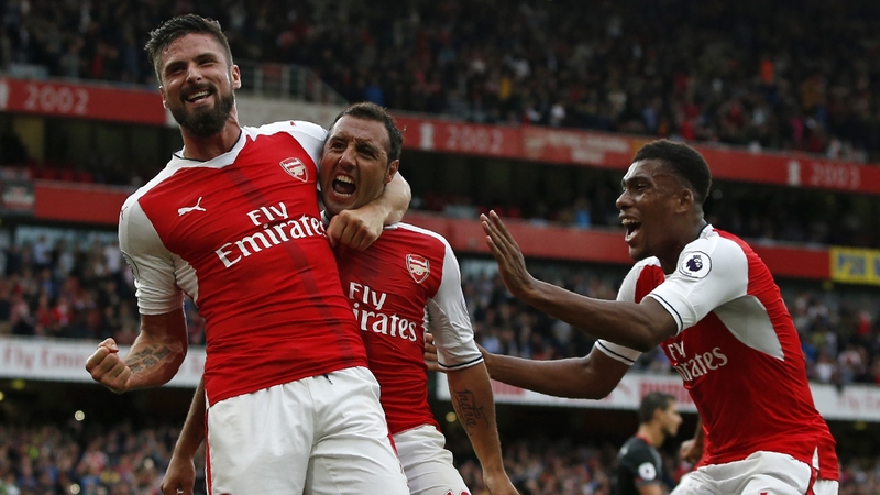 Santi Cazorla (C) held his nerve to win it for Arsenal