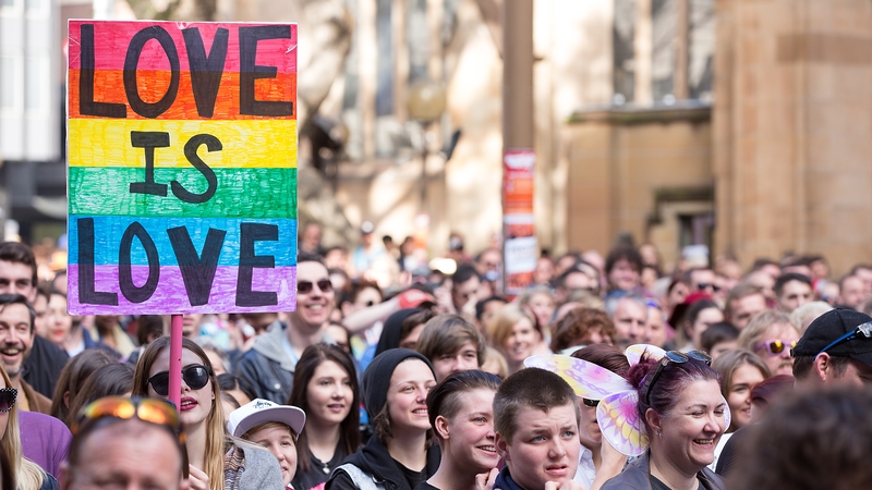 Activists march in Sydney during a rally in support of same-sex marriage
