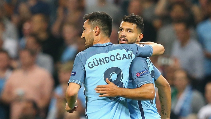 Ilkay Gundogan congratulates Sergio Aguero