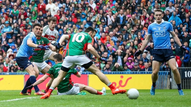 Mayo's Kevin McLoughlin puts the ball into his own net