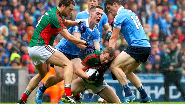 Tom Parsons and Colm Boyle battle with Brian Fenton and Diarmuid Connolly