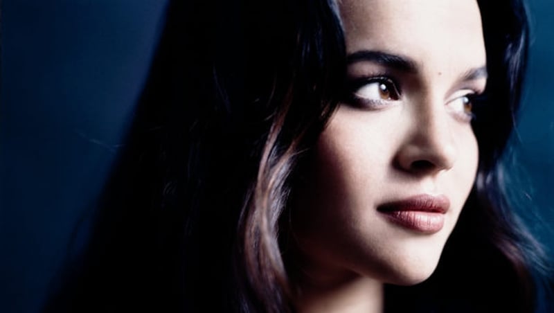 Norah Jones, pictured in 2002: rough mixes on the phone, listened to while walking the dog