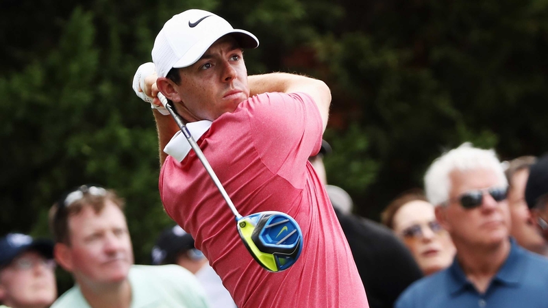 Rory McIlroy hits his tee shot on the seventh