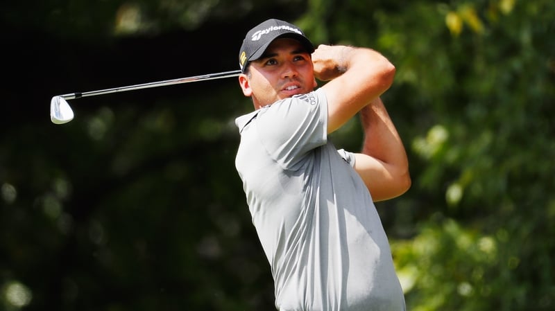 Day hits his second tee shot on Friday - shortly before he withdrew from the tournament