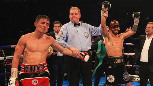 Anthony Crolla's hands are raised in victory