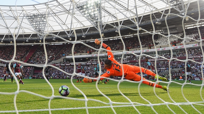 Austin's shot beats an outstretched Adrian