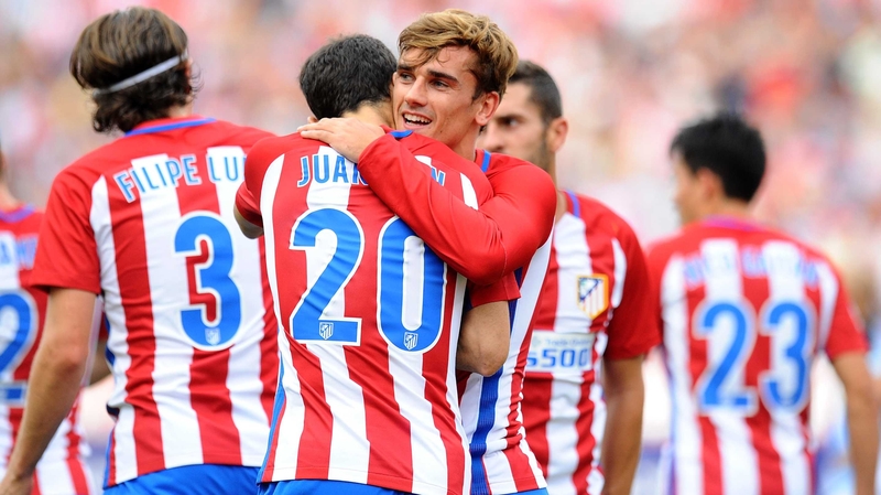 Antoine Greizmann celebrates with Juanfran