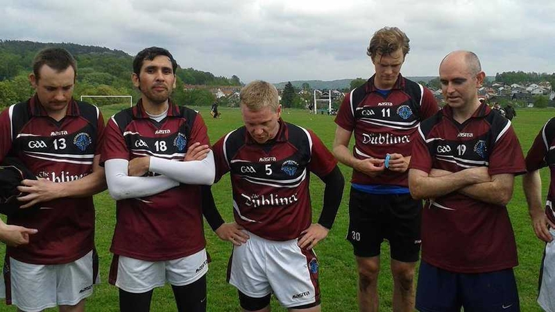 A tearful Billy Finn (centre) addresses the Gothenburg men's football team at the end of his last game before moving to the US