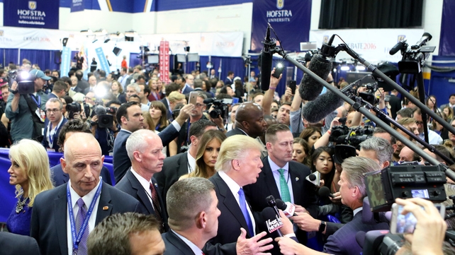 Donald Trump speaks to the media in the spin room