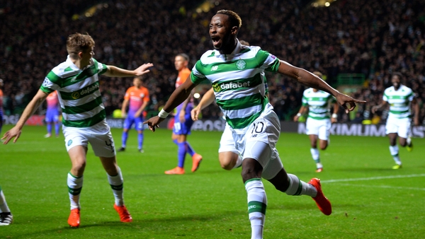 Moussa Dembele celebrates his opener at Celtic Park