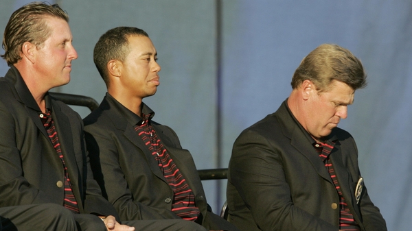 Phil Mickelson (L) with Tiger Woods and Hal Sutton