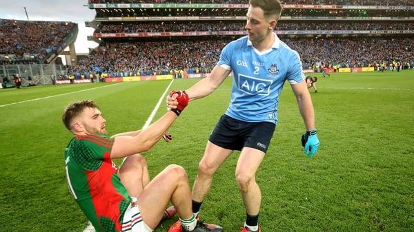 Dublin's Philip McMahon with Aidan O’Shea of Mayo after the game