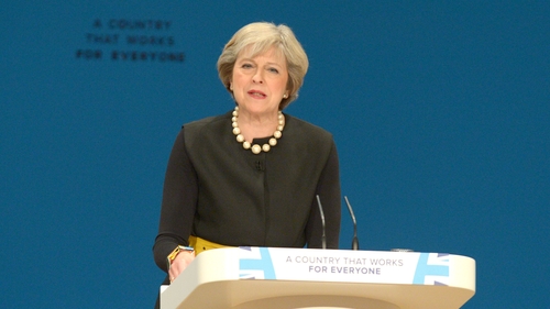 British Prime Minister Theresa May said she would trigger the process to leave the EU by the end of March