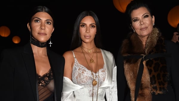 Kourtney and Kim Kardashian with their mother Kris Jenner