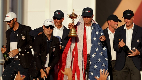 Davis Love holds aloft the Ryder Cup