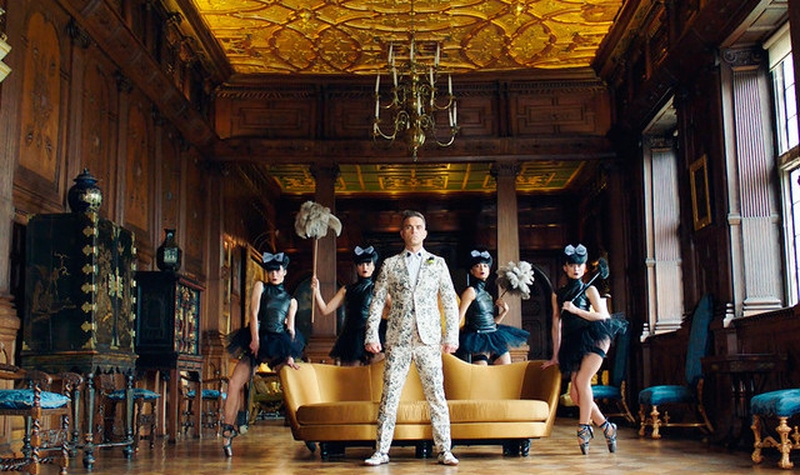 A still from the video of Robbie William's new single, Party Like A Russian