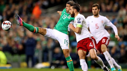 Walters gets his toe to the ball ahead of Guram Kashla