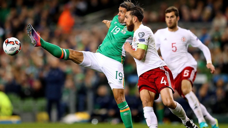 Walters gets his toe to the ball ahead of Guram Kashla